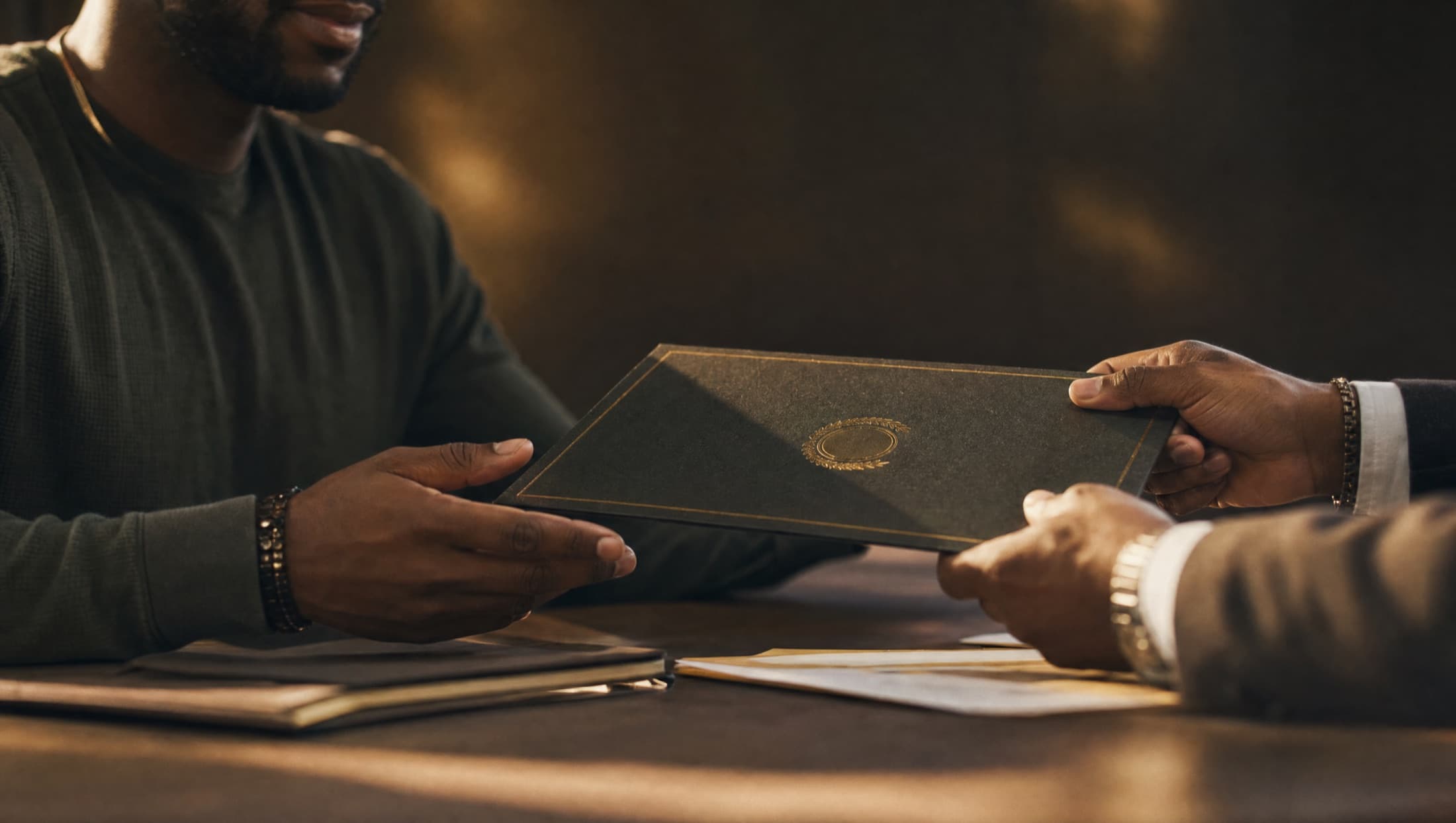 Hands holding a hard-earned certification, proof of a path forward